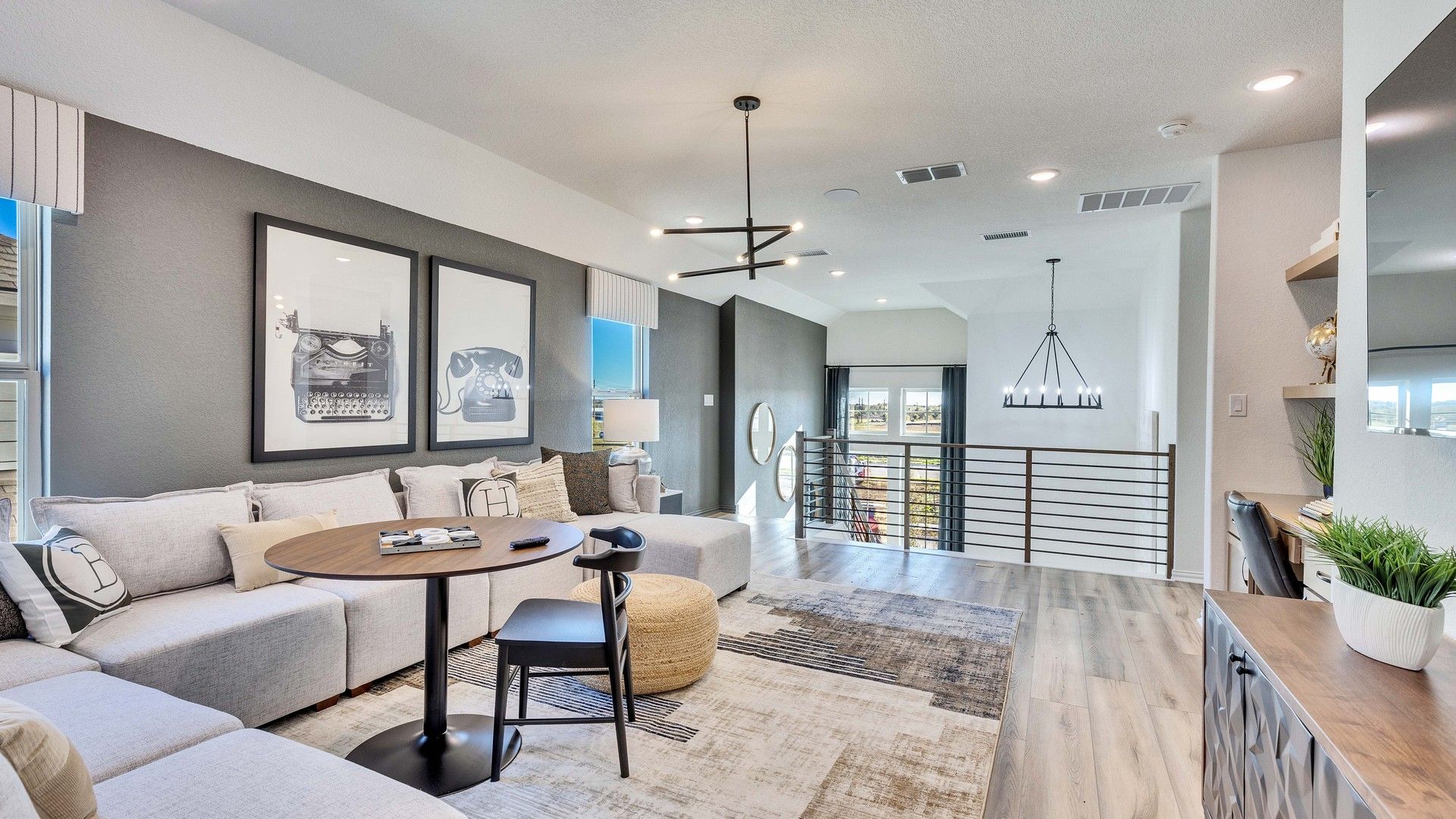 Luxurious Briarwood living room with plush seating, chic lighting, and elegant decor for sophisticated living.
