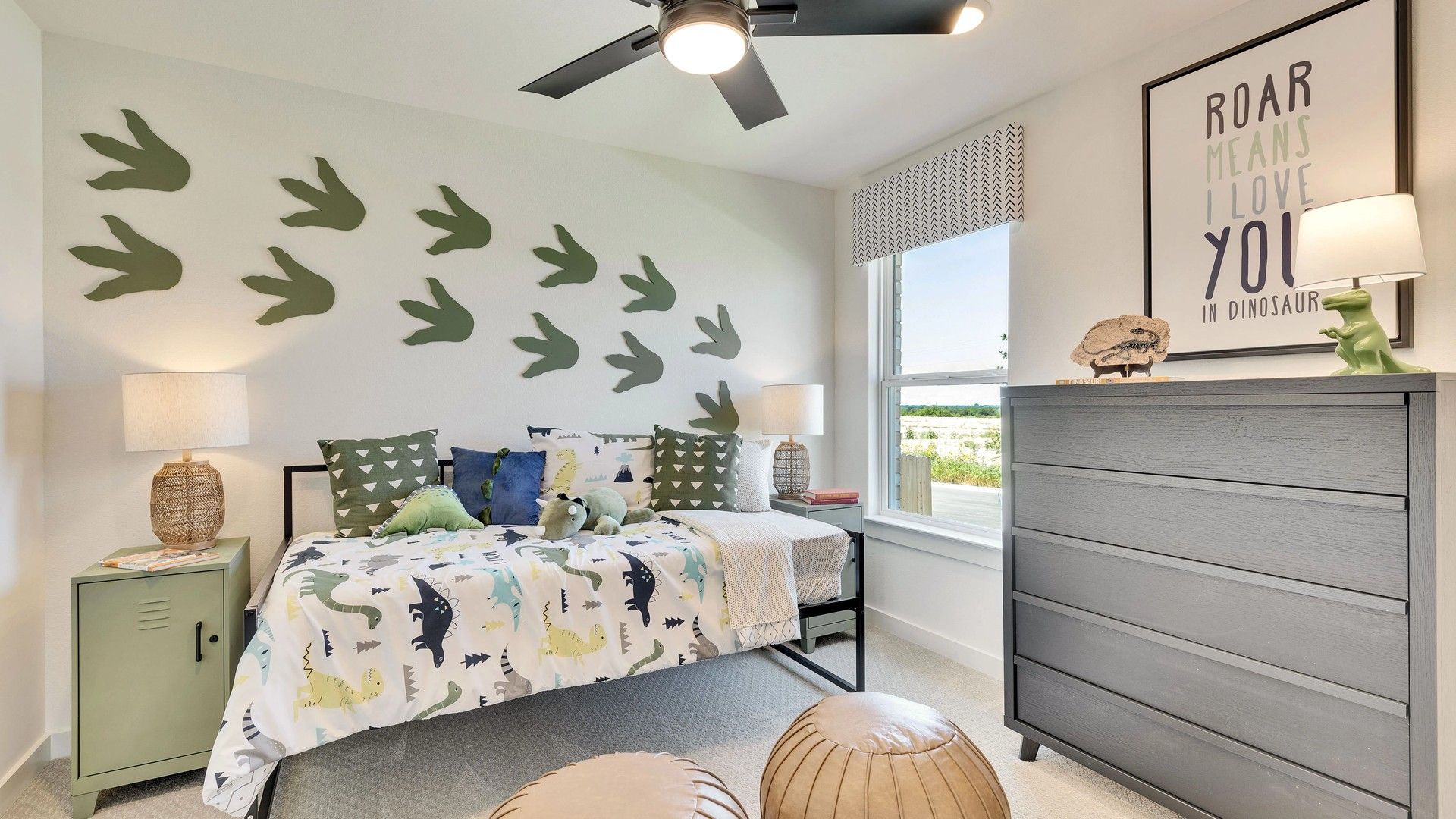 Chic children's room in Hunters Glen boasts dinosaur accents and sophisticated modern finishes.