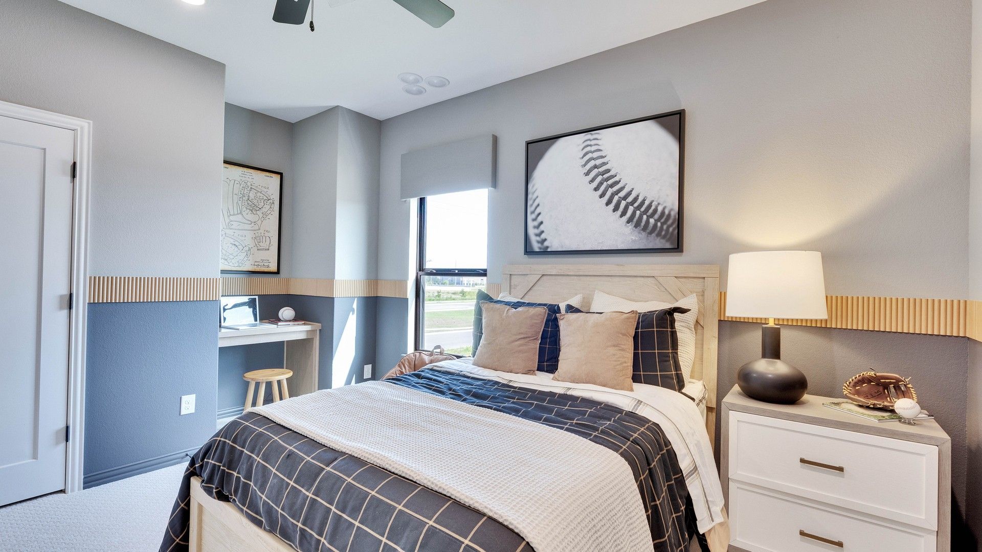 Luxurious bedroom features sleek lines, warm wood elements, and a spacious layout in Lakeside Meadows.