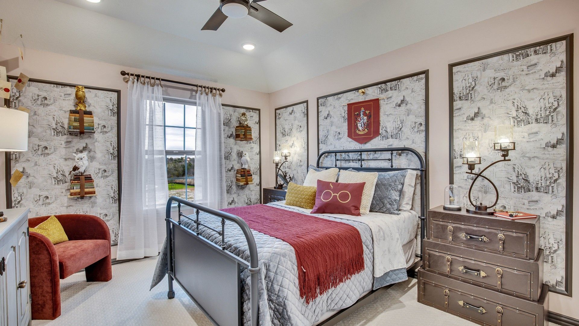 Opal Ranch bedroom boasts exquisite themed wallpaper, luxurious textiles, and a sleek iron bed design.