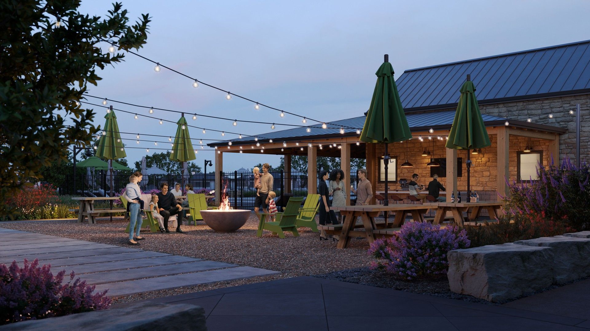 Revel in the Flora community's elegantly lit, stone-accented patio with charming string lights.