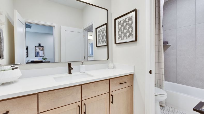 Indulge in luxury with elegant cabinetry, refined fixtures, and sophisticated tilework in Preserve at Lakeside Meadows.