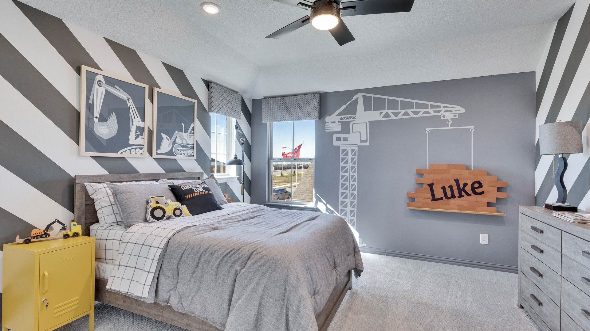 Experience playful design with bold striped walls and modern accents in Briarwood.