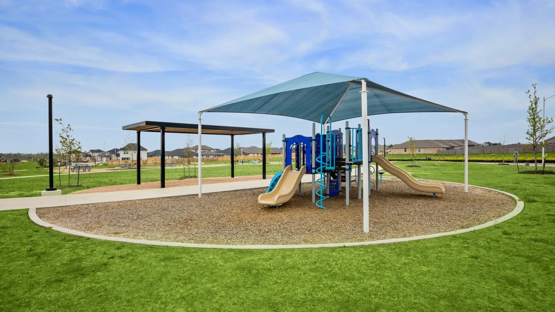 Discover the elegant playground with shaded slides and lush landscapes in Carillon community park.
