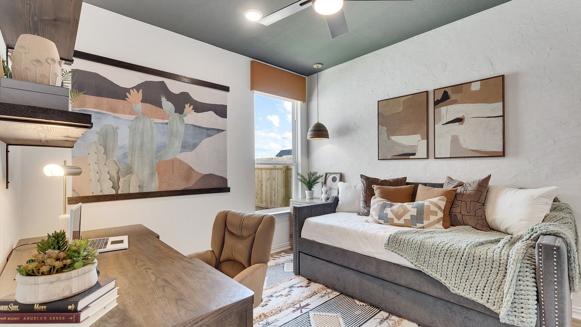 Elegant textured walls and warm rustic elements grace this luxurious study in Spring Creek community.