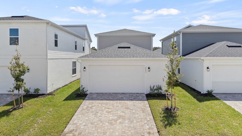 Lakeside at Satilla Ambersweet Rear Exterior by DRB Homes, Quick move in home at Trinity Place in Saint Cloud FL