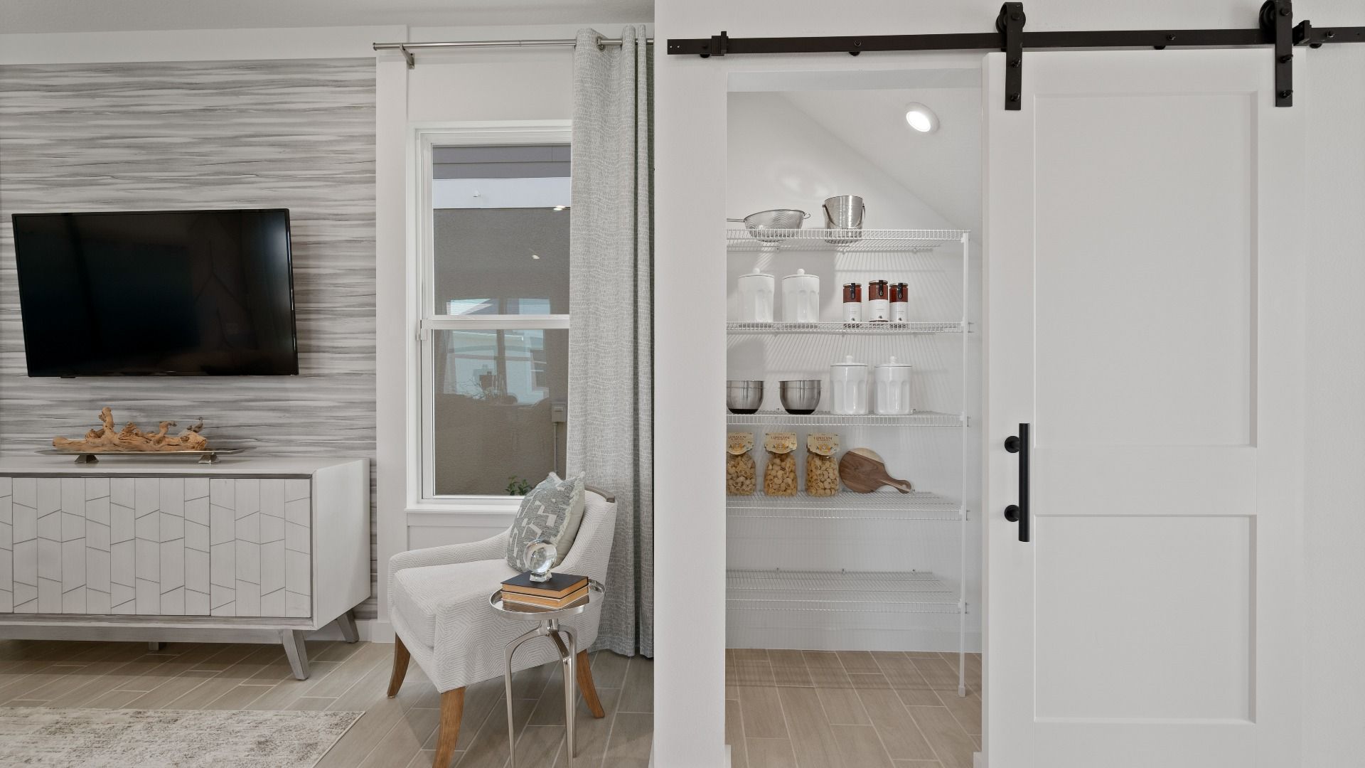 Trinity Place Staged Model Ambersweet Living Area and Pantry Space by DRB Homes in Saint Cloud FL