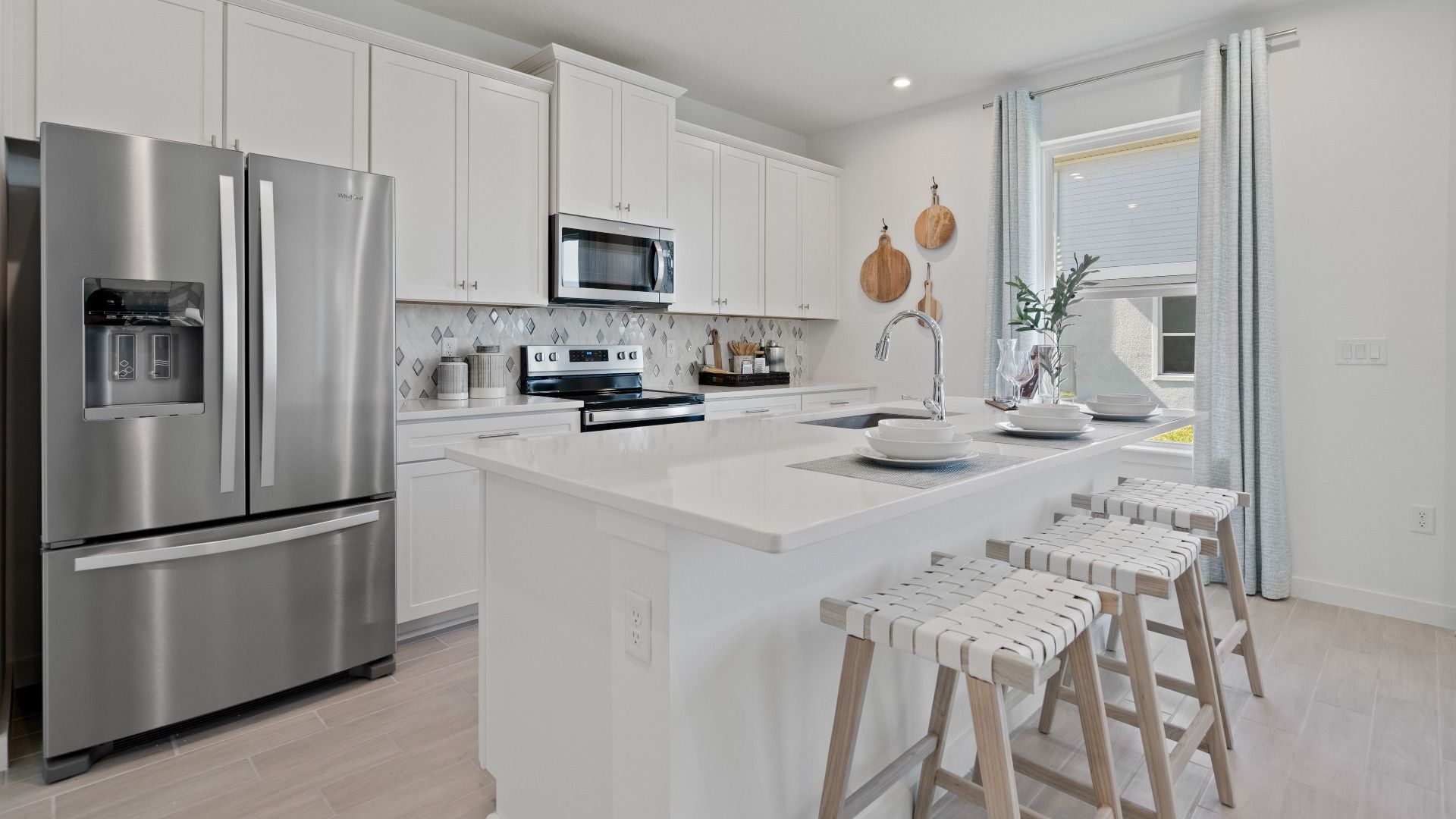 Trinity Place Staged Model Ambersweet Kitchen by DRB Homes in Saint Cloud FL