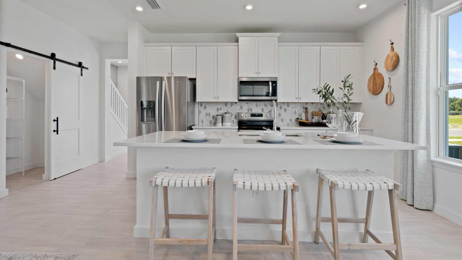 Trinity Place Staged Model Ambersweet Kitchen by DRB Homes in Saint Cloud FL