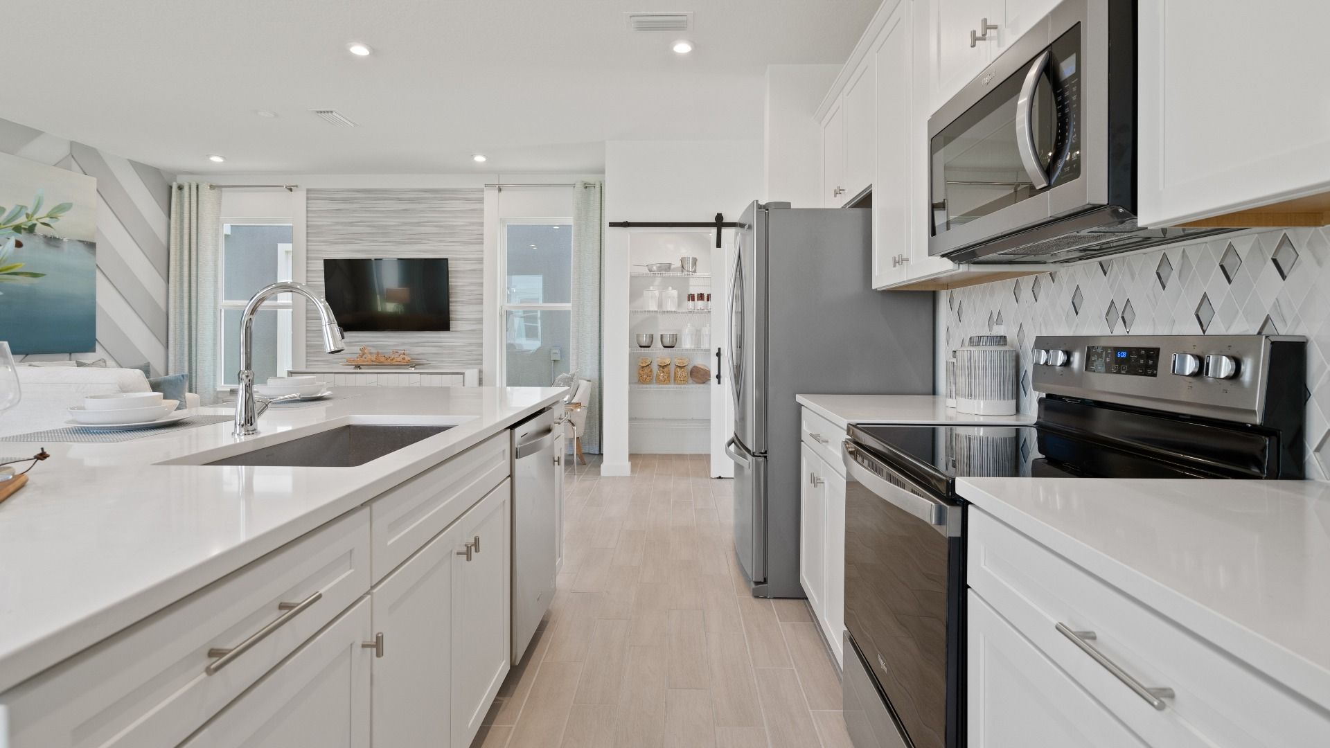 Trinity Place Staged Model Ambersweet Kitchen by DRB Homes in Saint Cloud FL