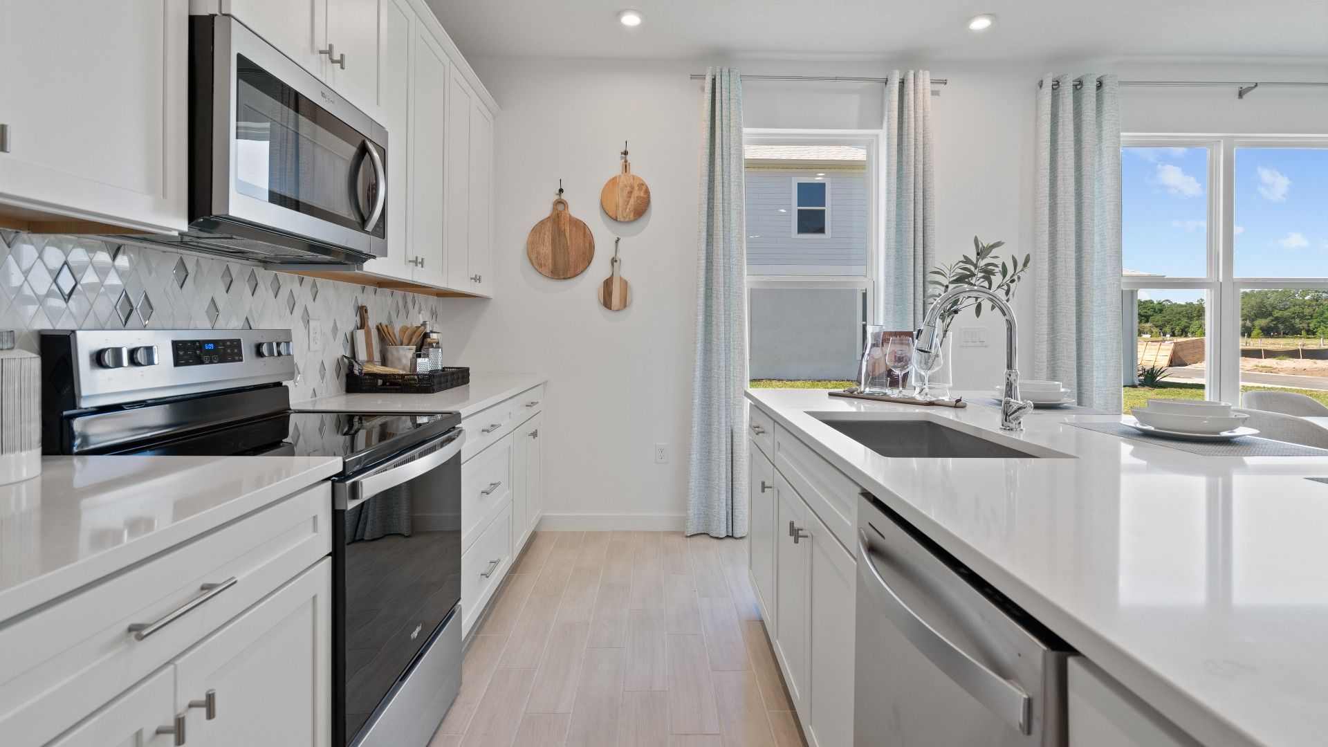 Trinity Place Staged Model Ambersweet Kitchen by DRB Homes in Saint Cloud FL