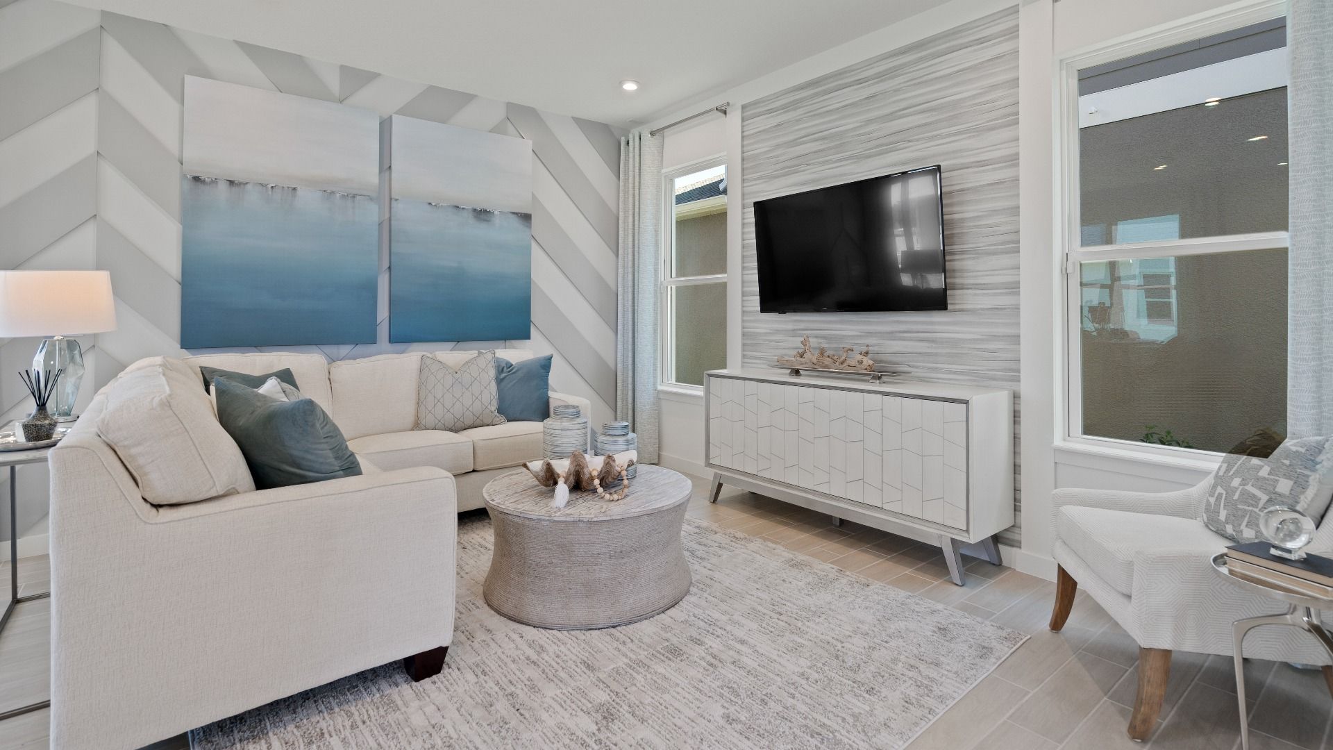 Trinity Place Staged Model Ambersweet Living Area by DRB Homes in Saint Cloud FL