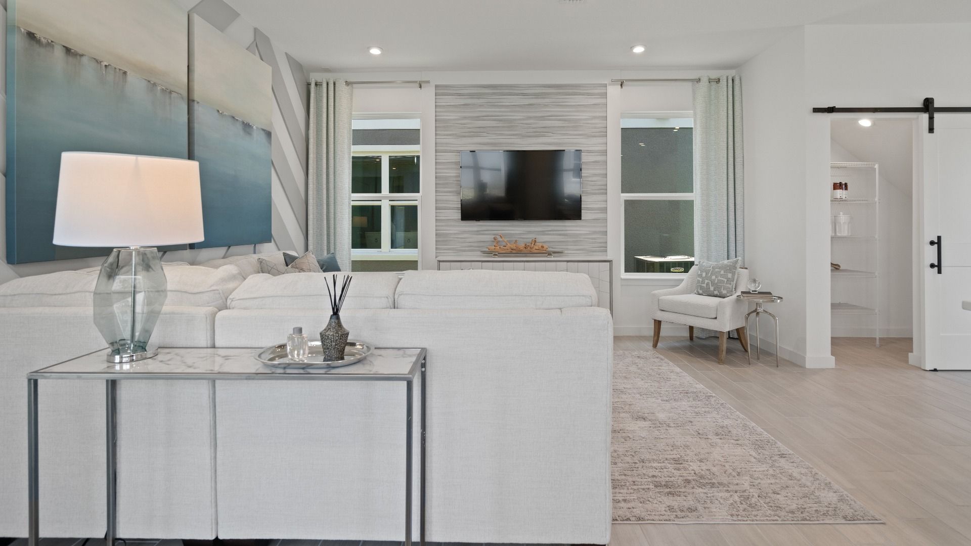 Trinity Place Staged Model Ambersweet Living Area by DRB Homes in Saint Cloud FL