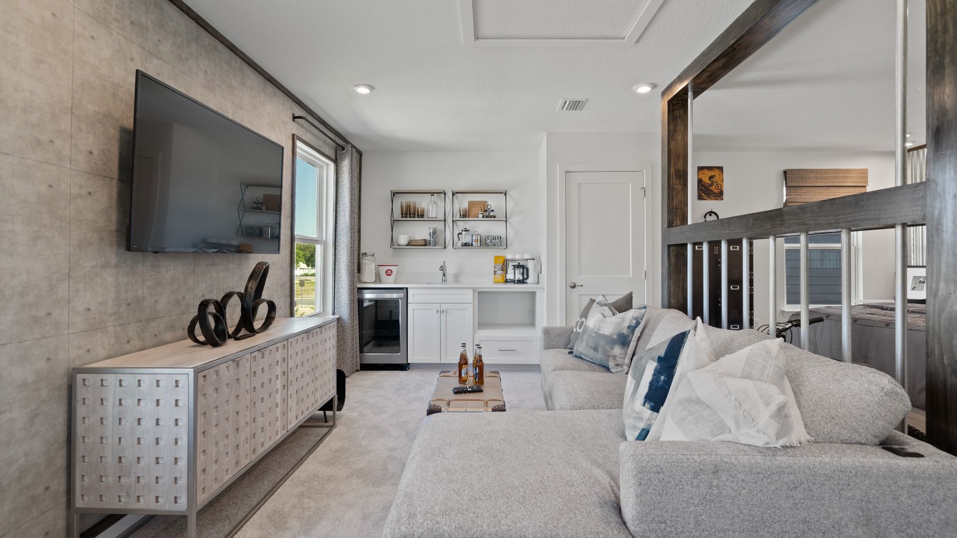 Trinity Place Staged Model Ambersweet Loft Area by DRB Homes in Saint Cloud FL