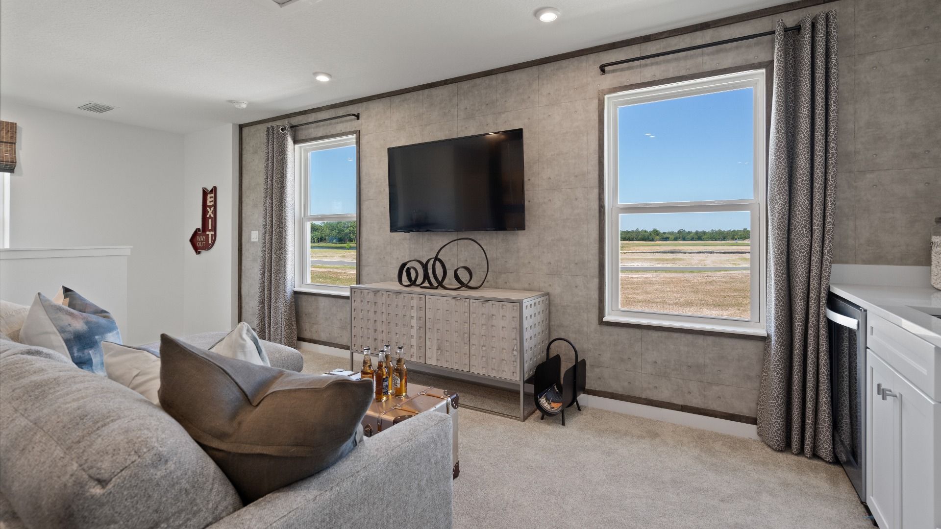 Trinity Place Staged Model Ambersweet Loft Area by DRB Homes in Saint Cloud FL