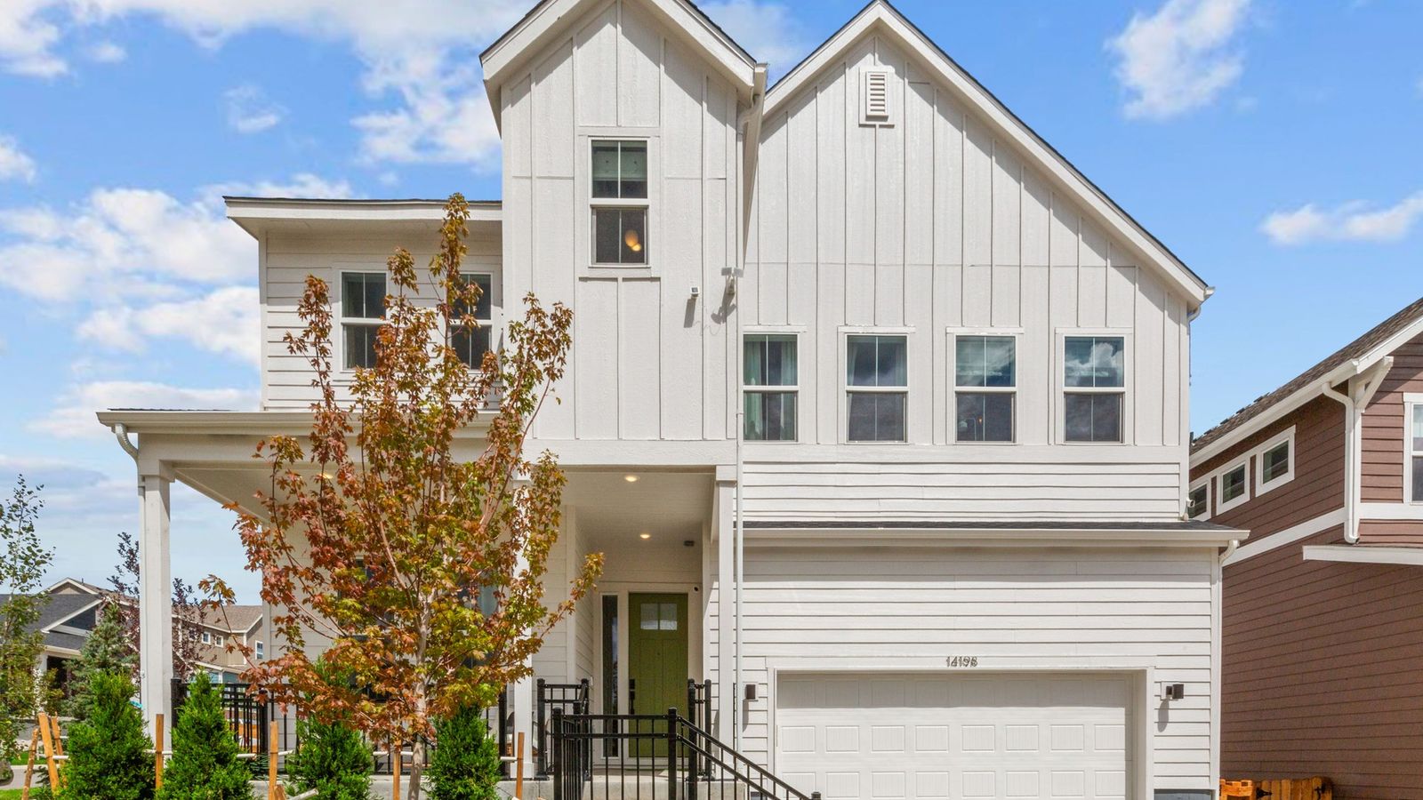 Discover exquisite board and batten cladding and a serene color palette at Dillon Pointe.