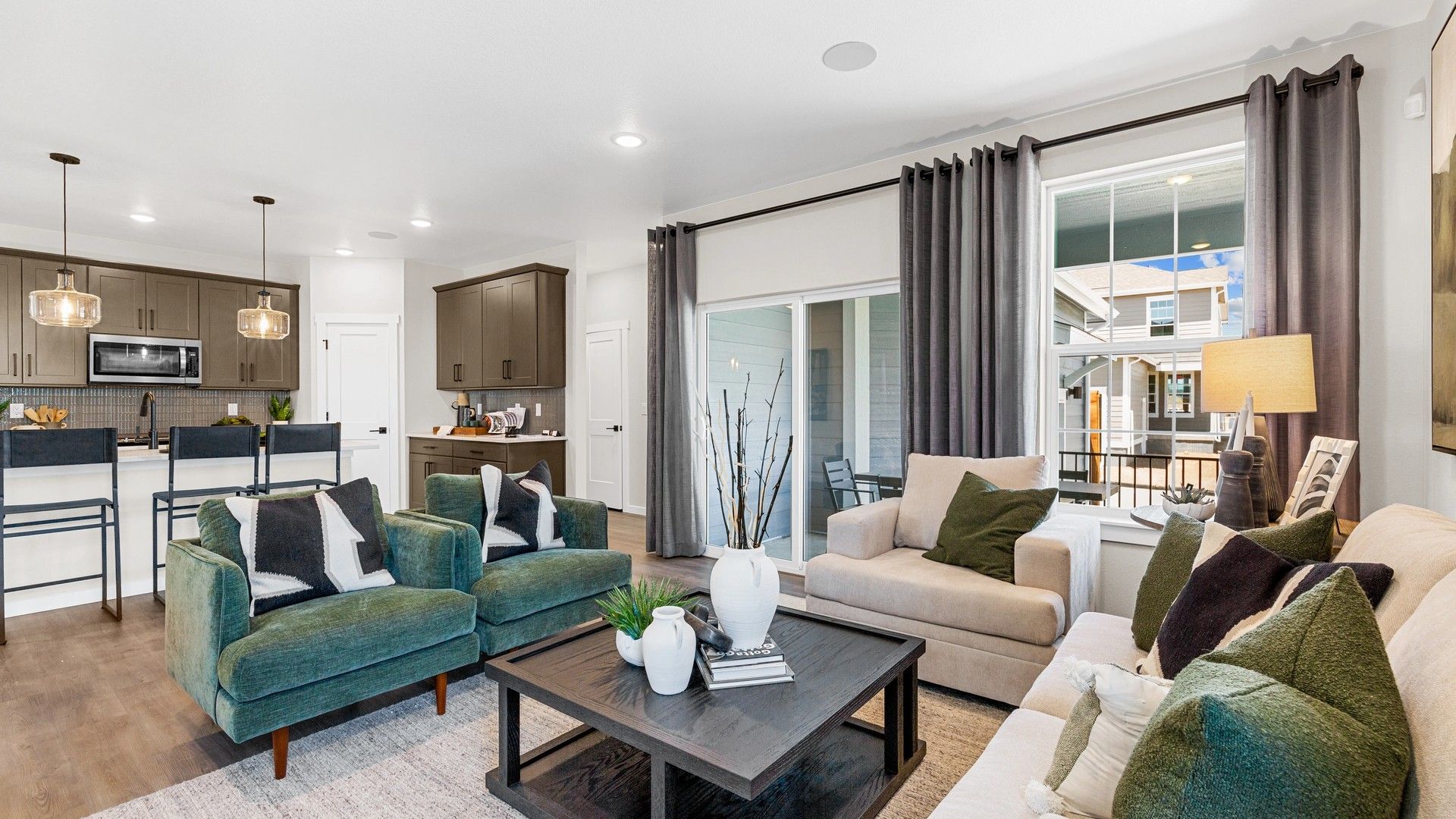 Experience refined elegance with plush seating and sleek fixtures in this Timnath Lakes residence.