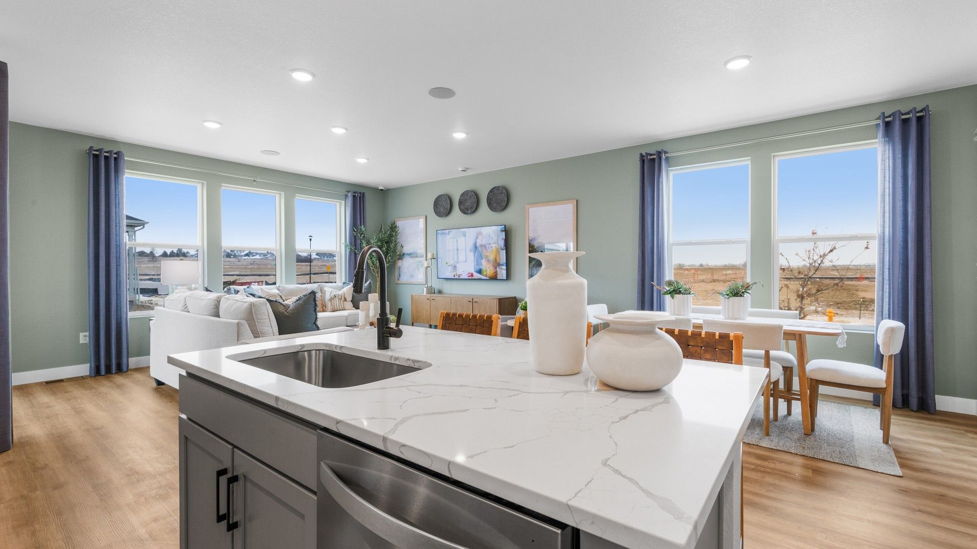 Revel in luxury with a marble island and panoramic windows in Bloom's elegant interiors.