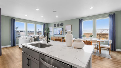 Revel in luxury with a marble island and panoramic windows in Bloom's elegant interiors.