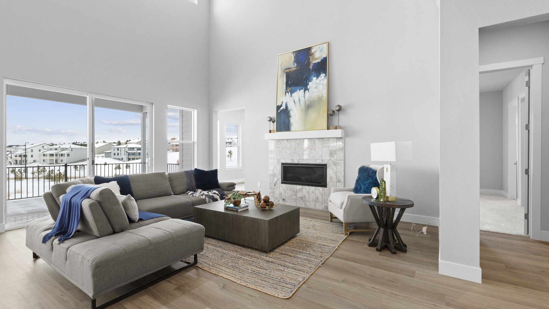 Experience luxurious high ceilings and a stunning marble fireplace in Montaine's exquisite living spaces.