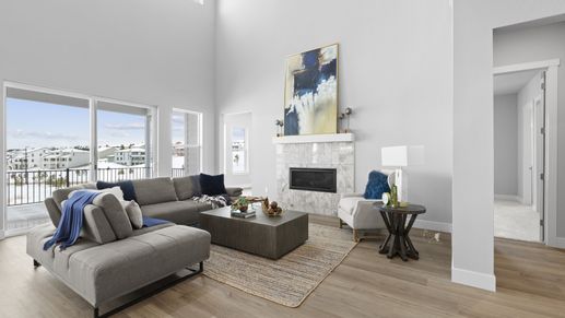 Experience luxurious high ceilings and a stunning marble fireplace in Montaine's exquisite living spaces.