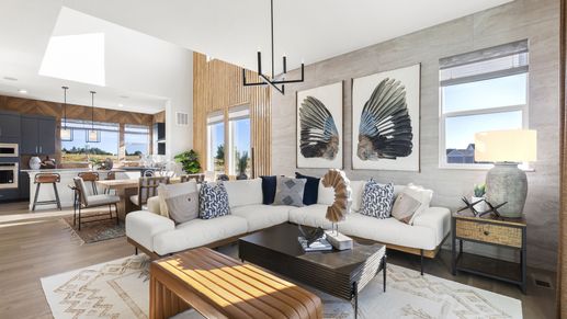 Experience luxury in Dillon Pointe's open space featuring elegant wood accents and high-end natural lighting.