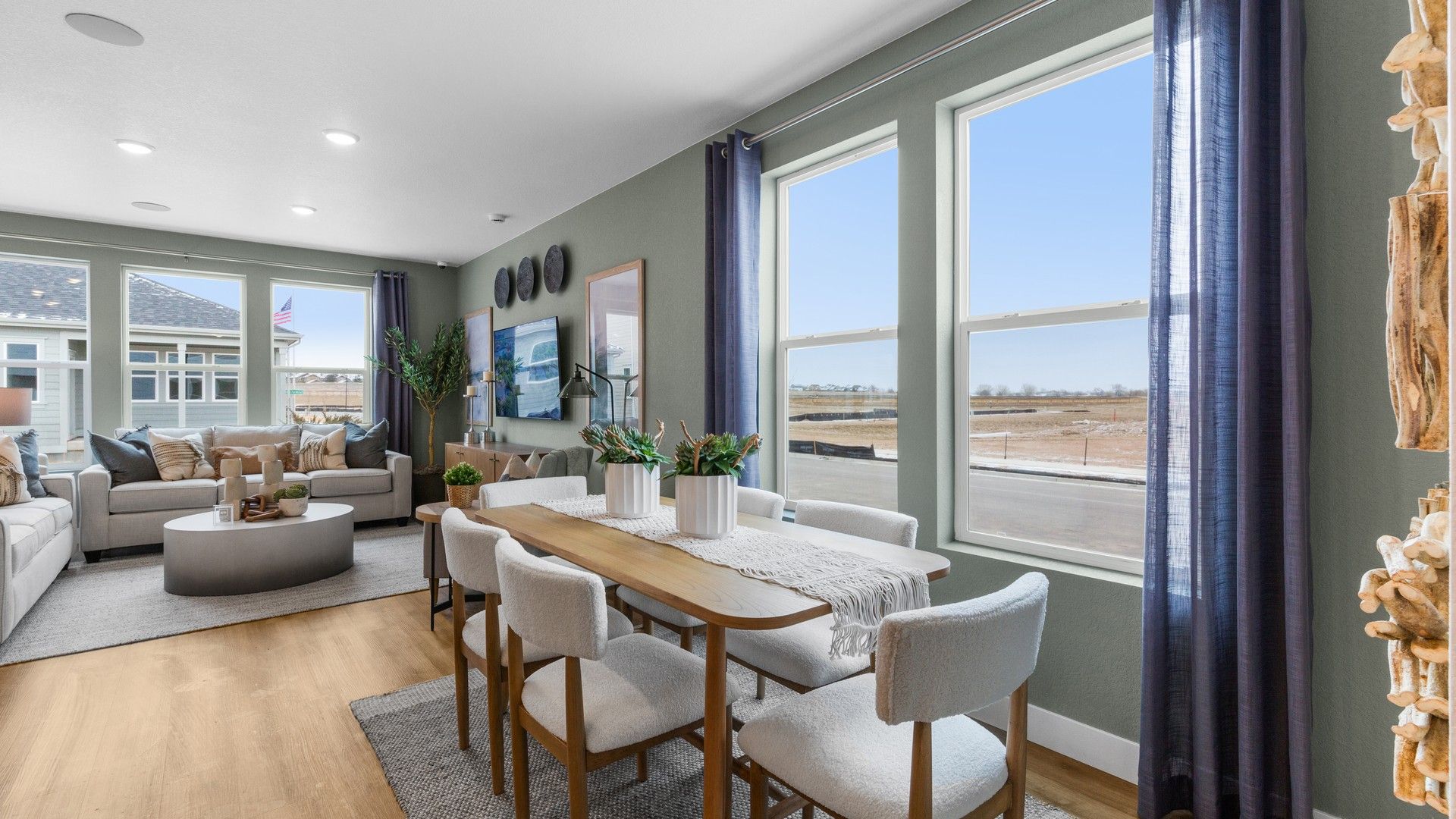 Experience high-end design with expansive windows, chic decor, and premium hardwood floors in Bloom.