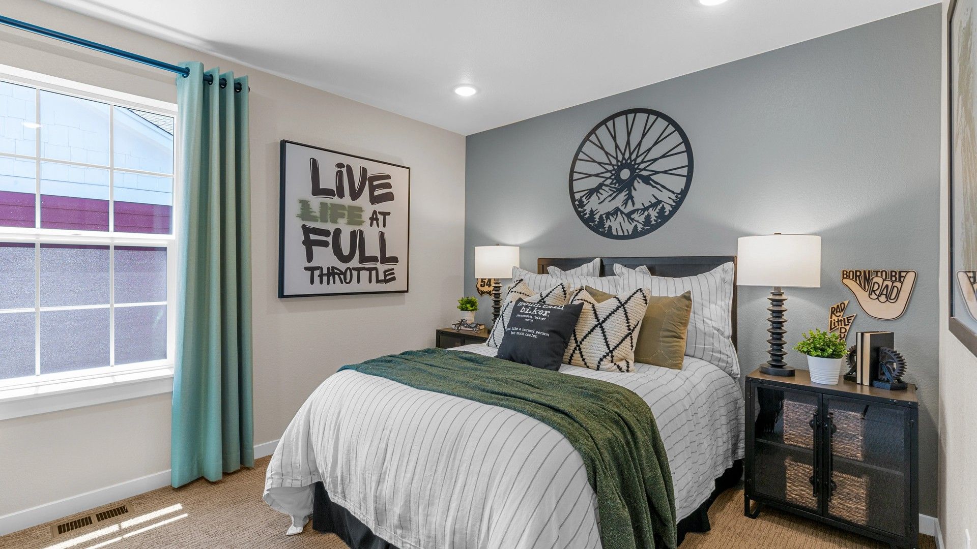 Elegant bedroom in Timnath Lakes with striking wall art, modern decor, and upscale finishes.