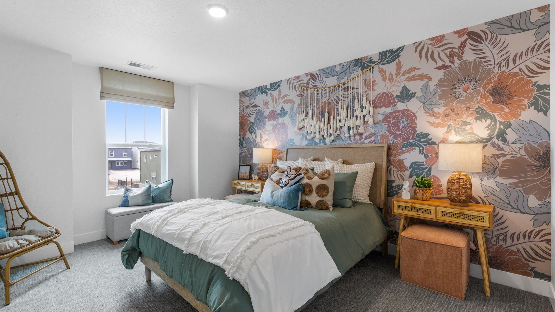 Elegant floral accent wall complements modern decor in this Phoenix luxury bedroom.
