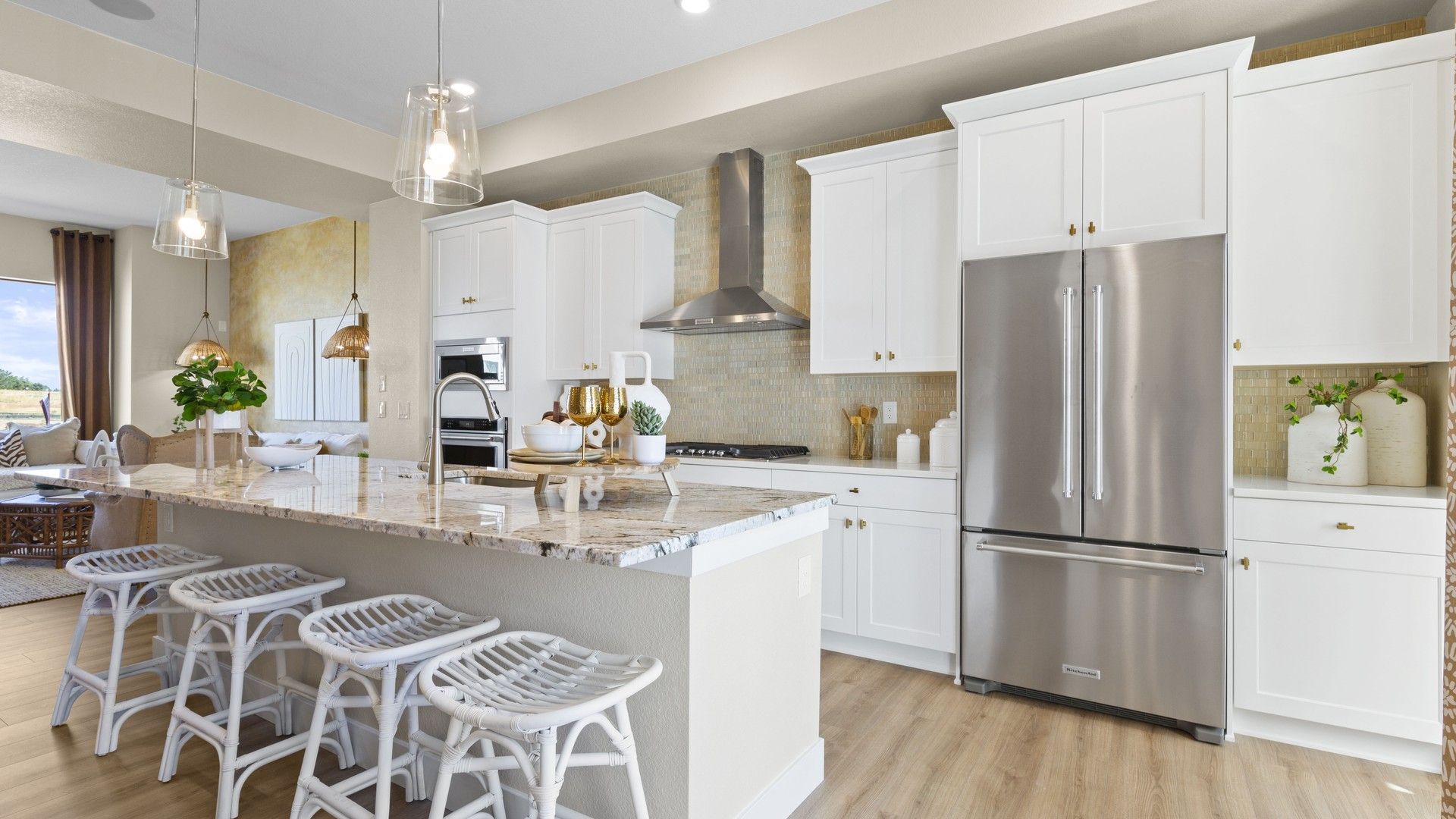 Exquisite marble countertops and sleek cabinetry showcase sophistication in Dillon Pointe’s elegant spaces.