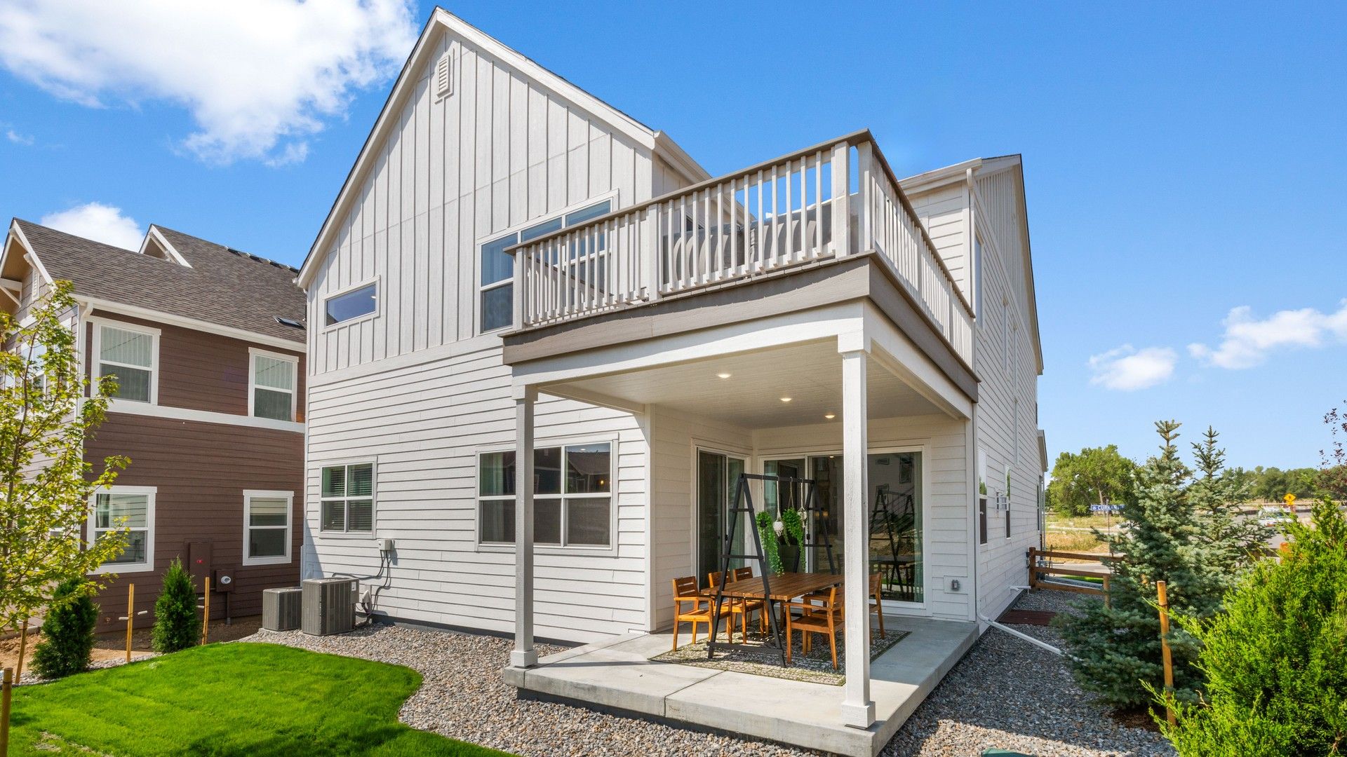 Experience luxury with a spacious balcony, pristine patio, and exquisite landscaping in Dillon Pointe.