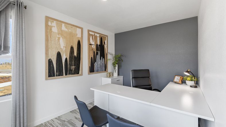 Experience luxury residential architecture with a modern home office design. Sleek and sophisticated elements.