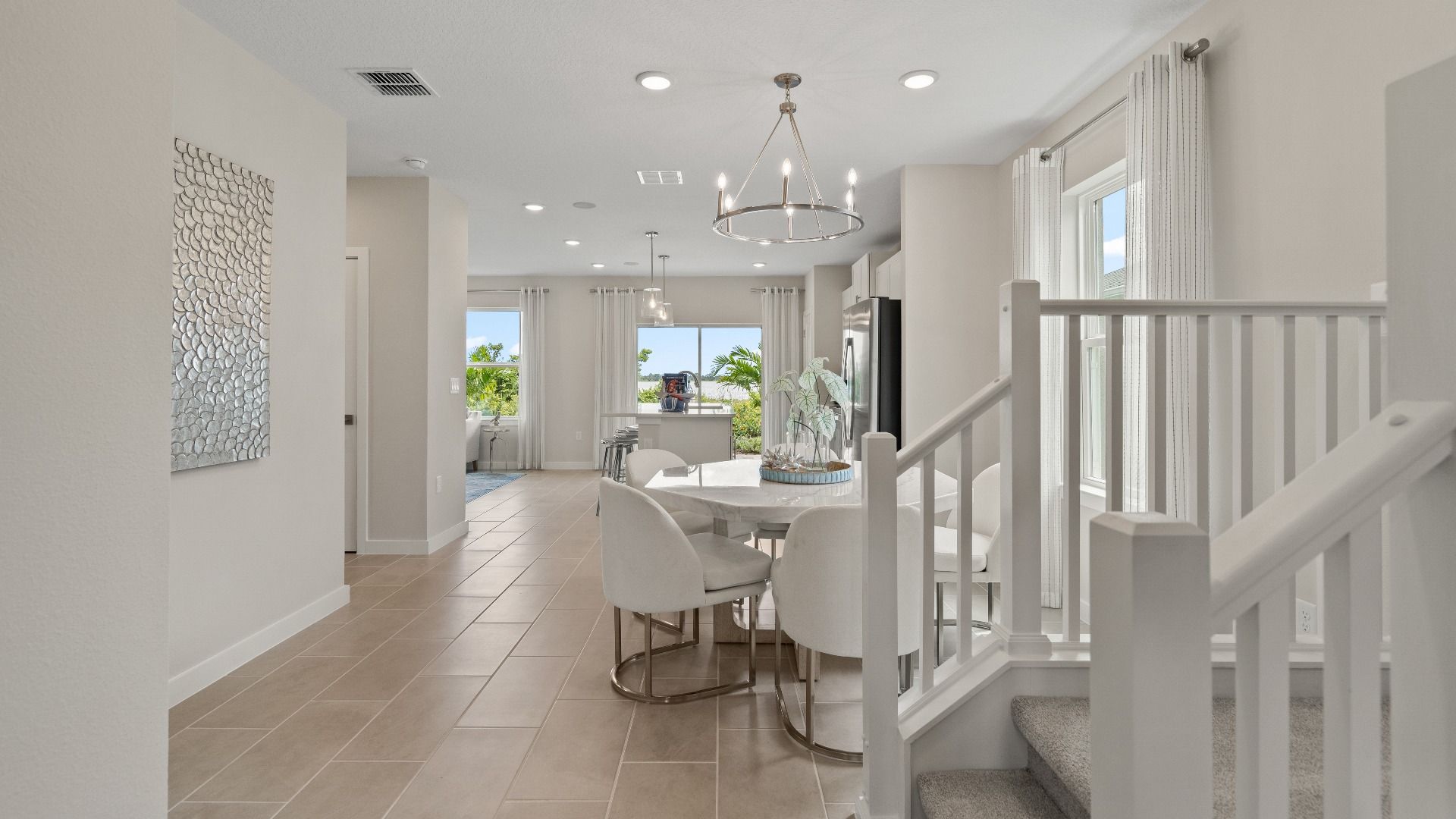 Ponte Vedra Model Home Dining Area and Stairs at Willowbrook North by DRB Homes in Winter Haven FL