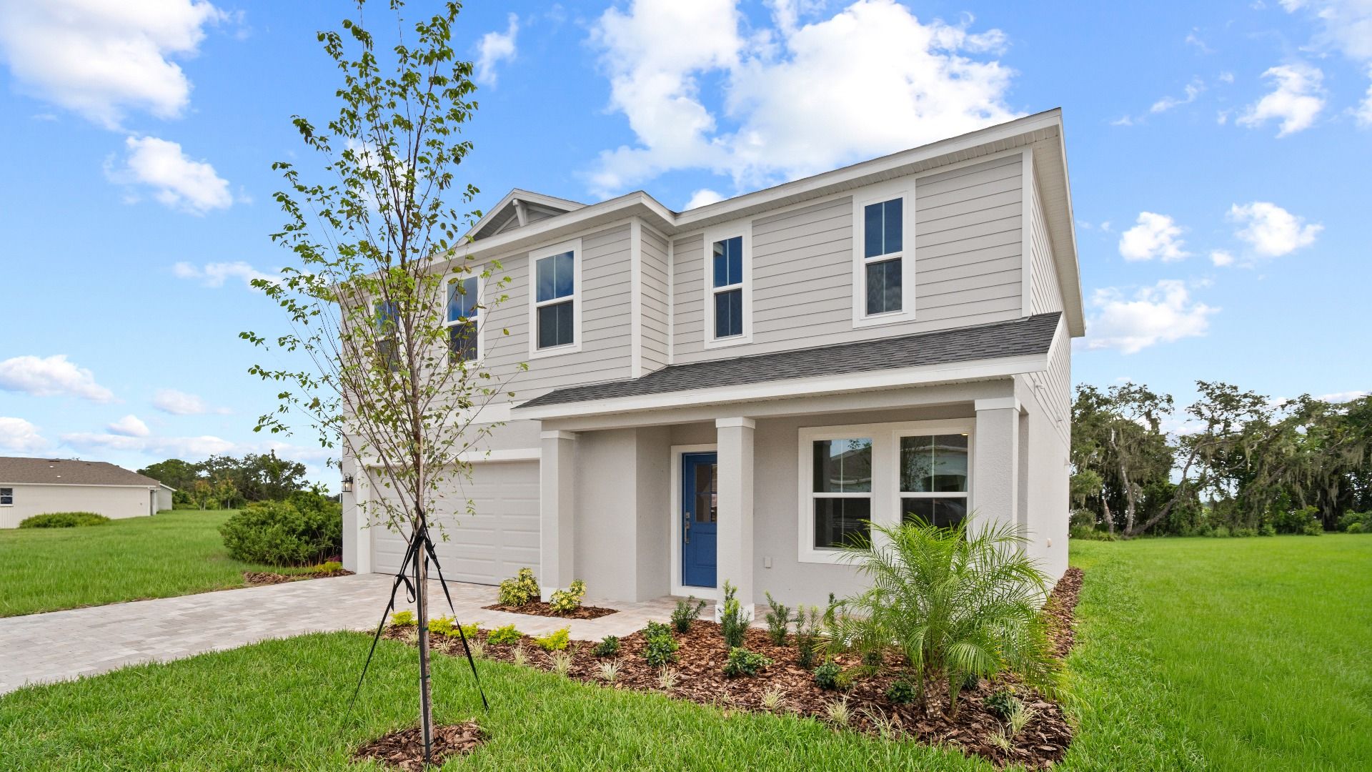 Highbourne Elevation by DRB Homes in Willowbrook North located on Lake Fannie in Winter Haven, FL.