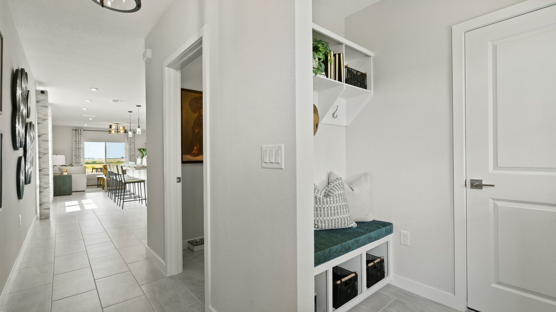 The Atlantic Model by DRB Homes Bright and Welcoming Entry with Access to the 2-car garage.