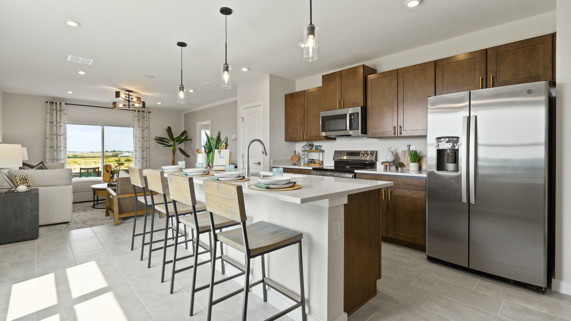 The Atlantic Model by DRB Homes Kitchen features a large kitchen Island and premium finishes.