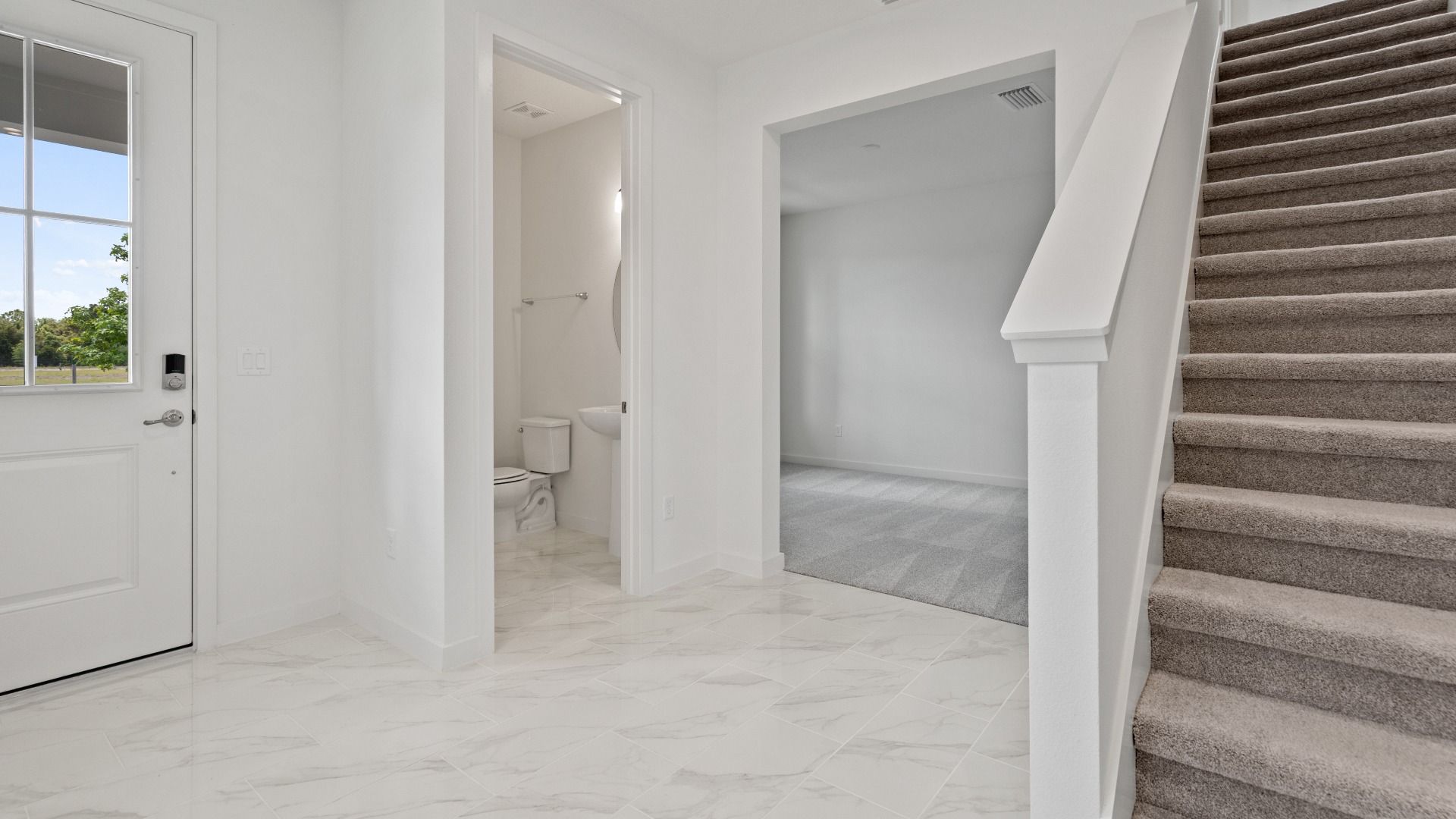Mandarin Interior Entry at Trinity place by DRB Homes Orlando in Saint Cloud, FL