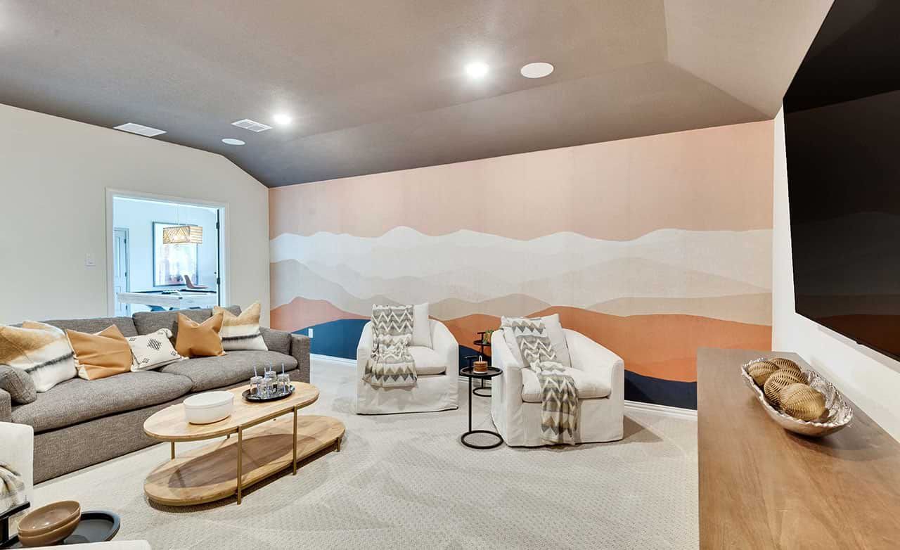 Elegant living room in San Gabriel with artful mural, plush sofas, and refined wood accents.