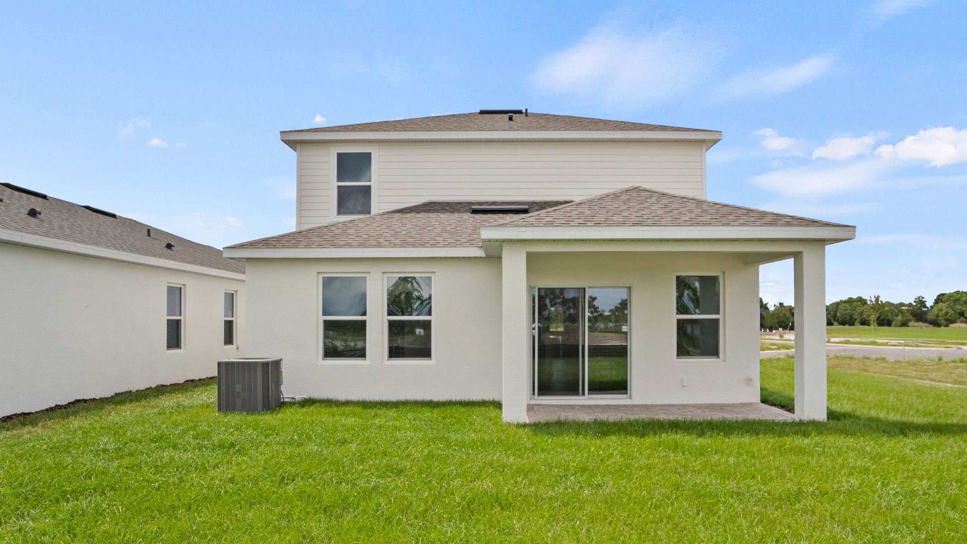 The Naples Back Exterior Quick Move-In Home at Willowbrook North by DRB Homes in Winter Haven, FL