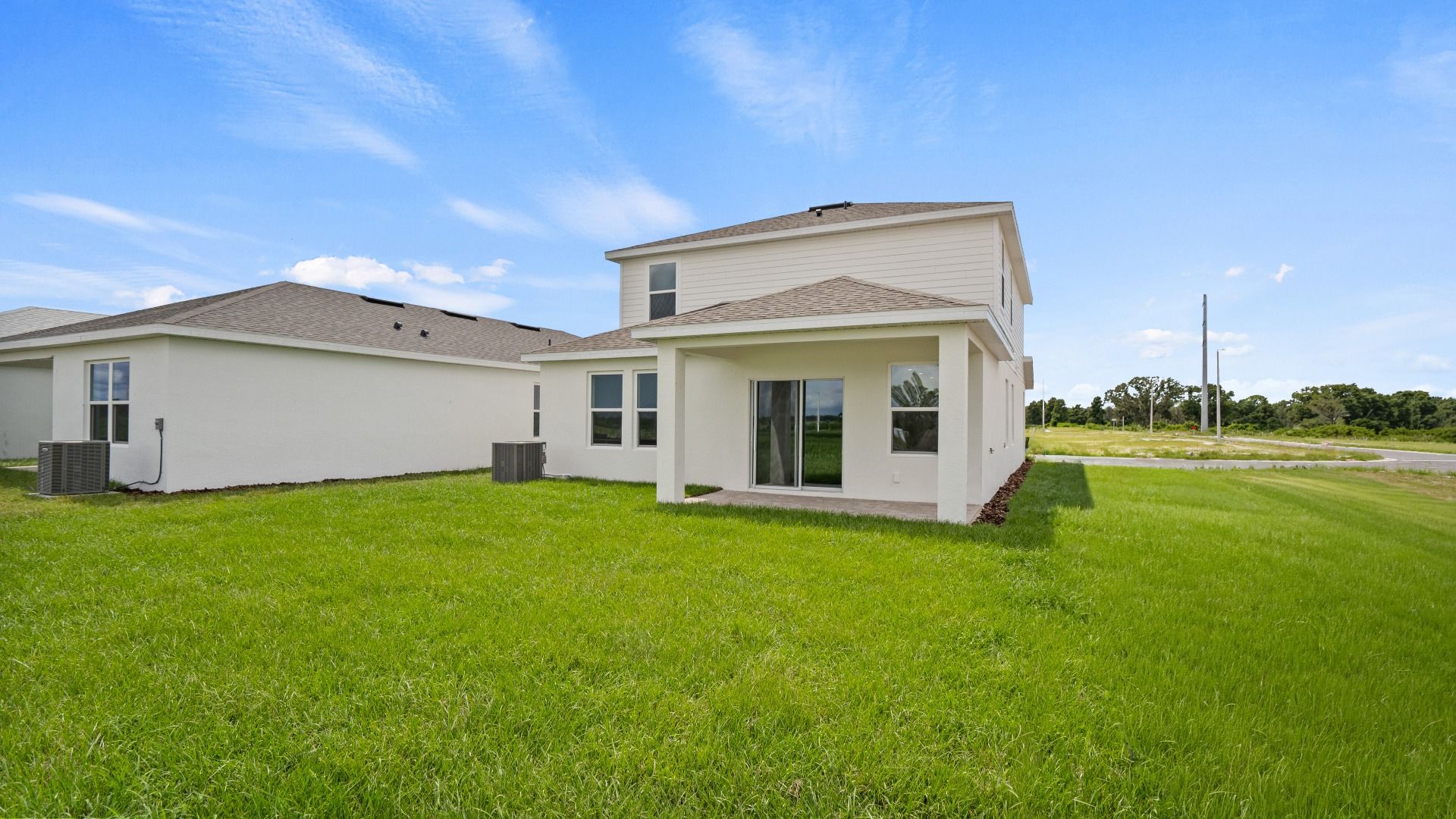 The Naples Back Exterior Quick Move-In Home at Willowbrook North by DRB Homes in Winter Haven, FL