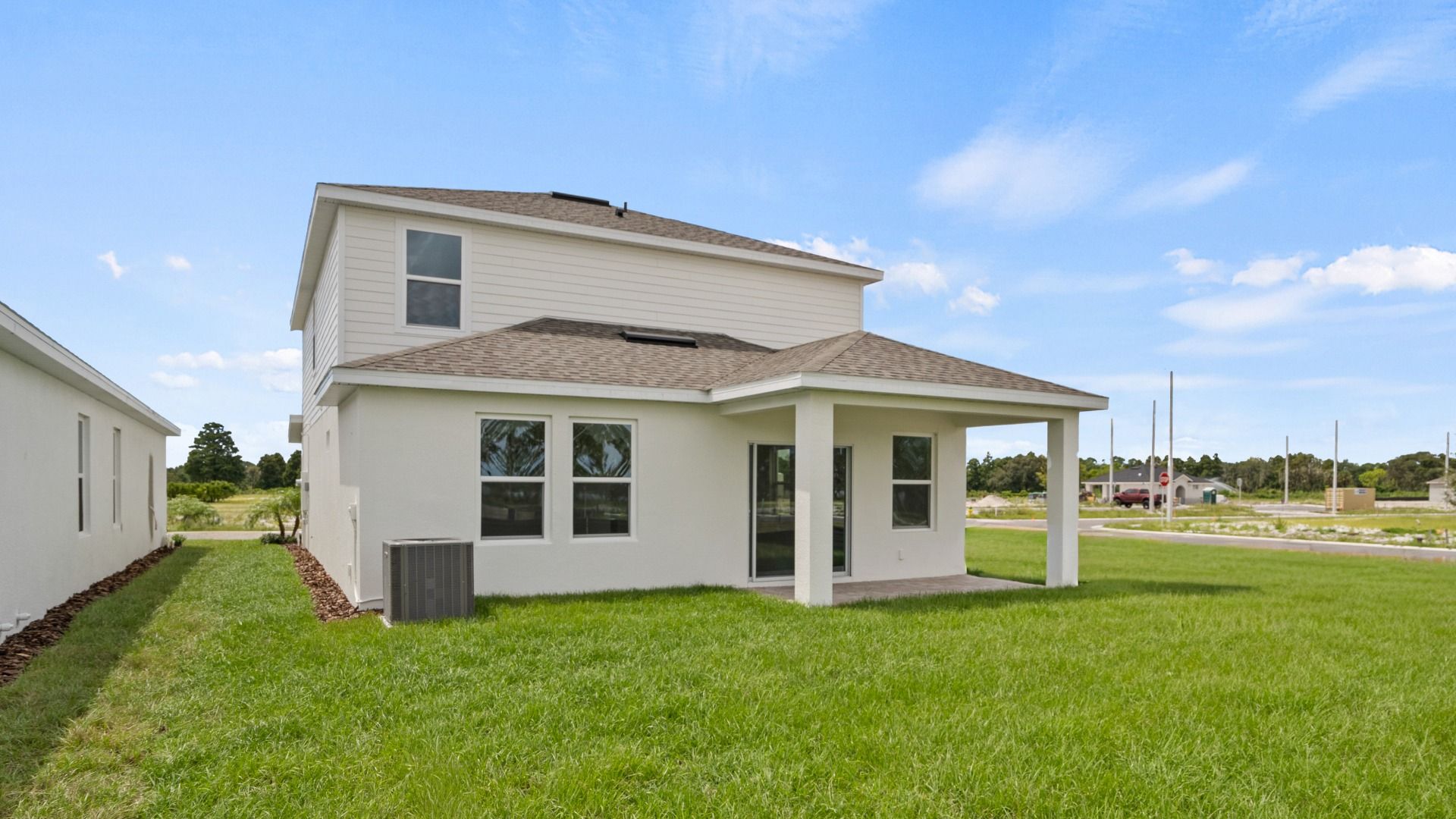 The Naples Back Exterior Quick Move-In Home at Willowbrook North by DRB Homes in Winter Haven, FL