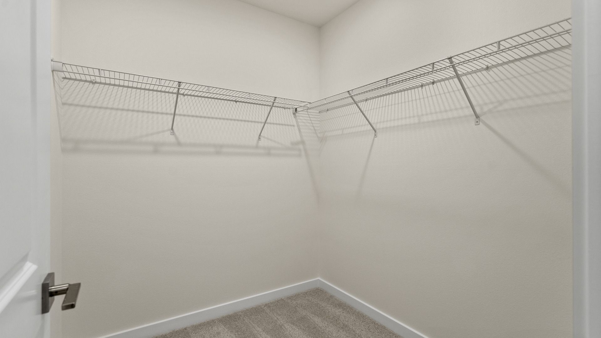The Naples First Floor Primary walk-in closet Quick Move-In Home at Willowbrook North by DRB Homes in Winter Haven, FL