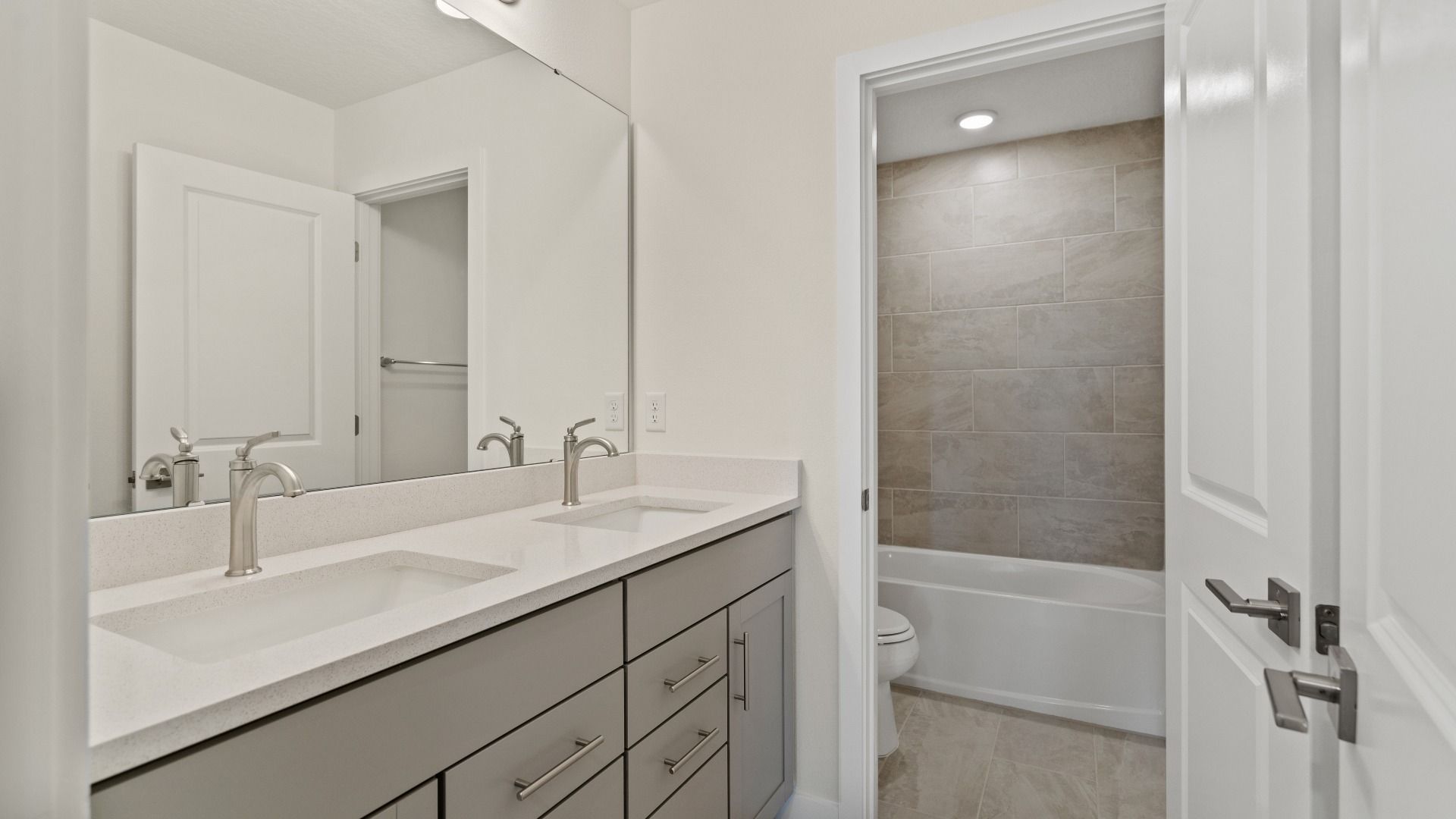 The Naples Second Floor Second Bathroom in Quick Move-In Home at Willowbrook North by DRB Homes in Winter Haven, FL