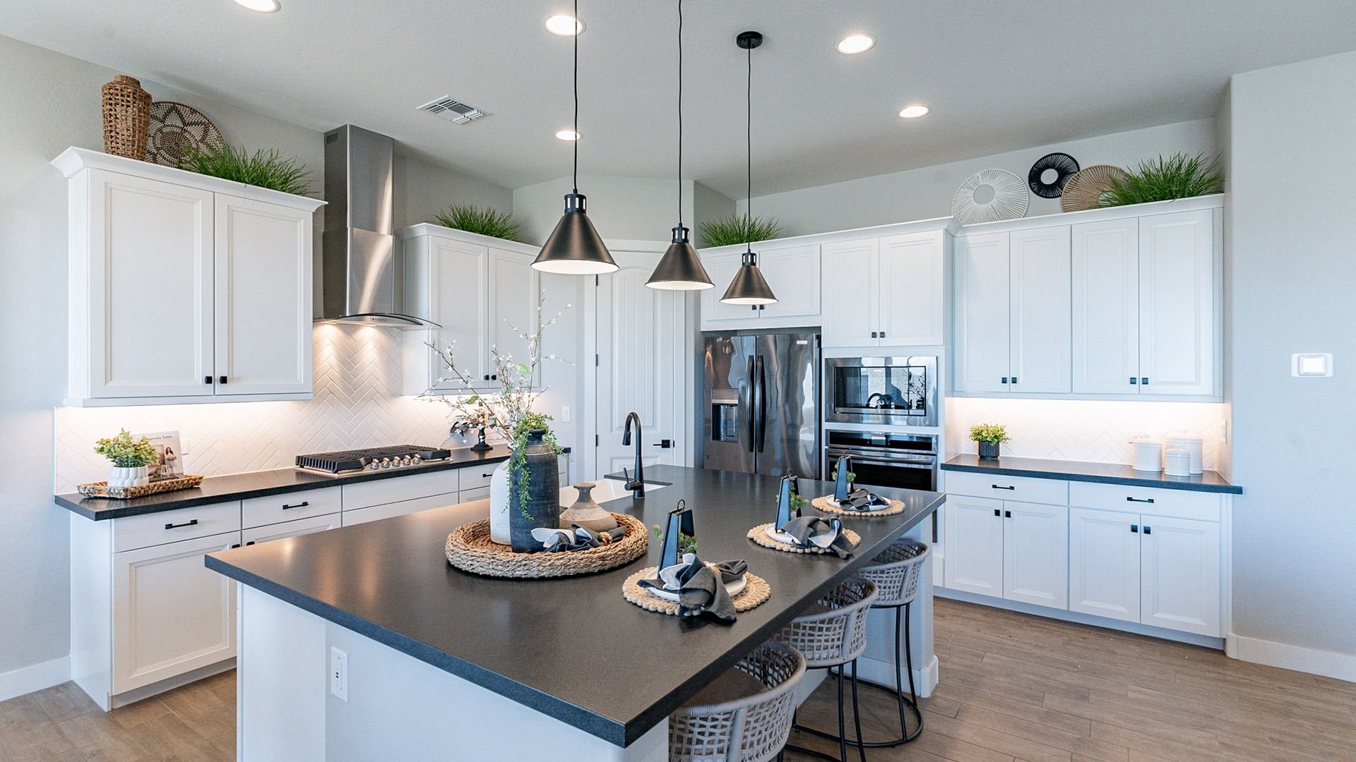 Experience luxurious design with elegant cabinetry, chic countertops, and stylish lighting in Arroyo Seco's Hacienda.