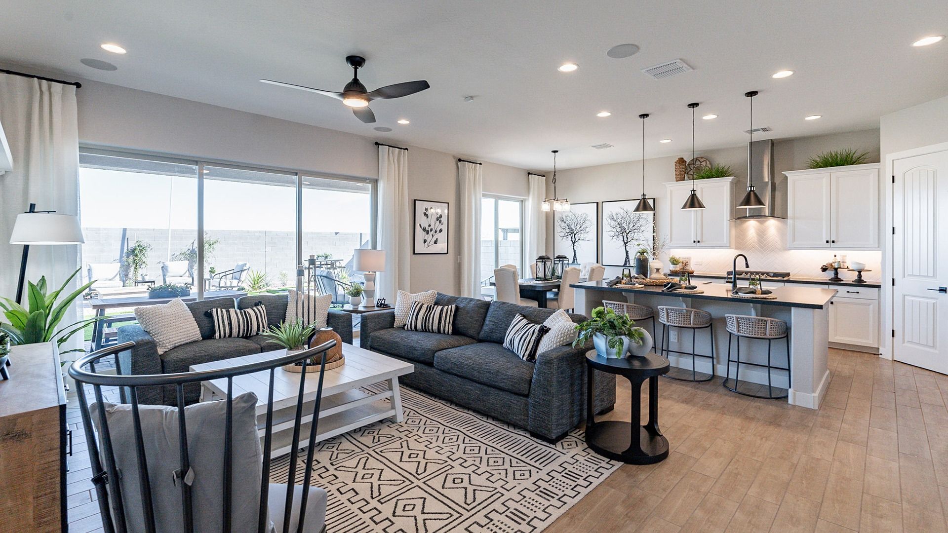 Bask in the elegance of open-plan luxury, featuring exquisite wood flooring and expansive windows in Arroyo Seco.