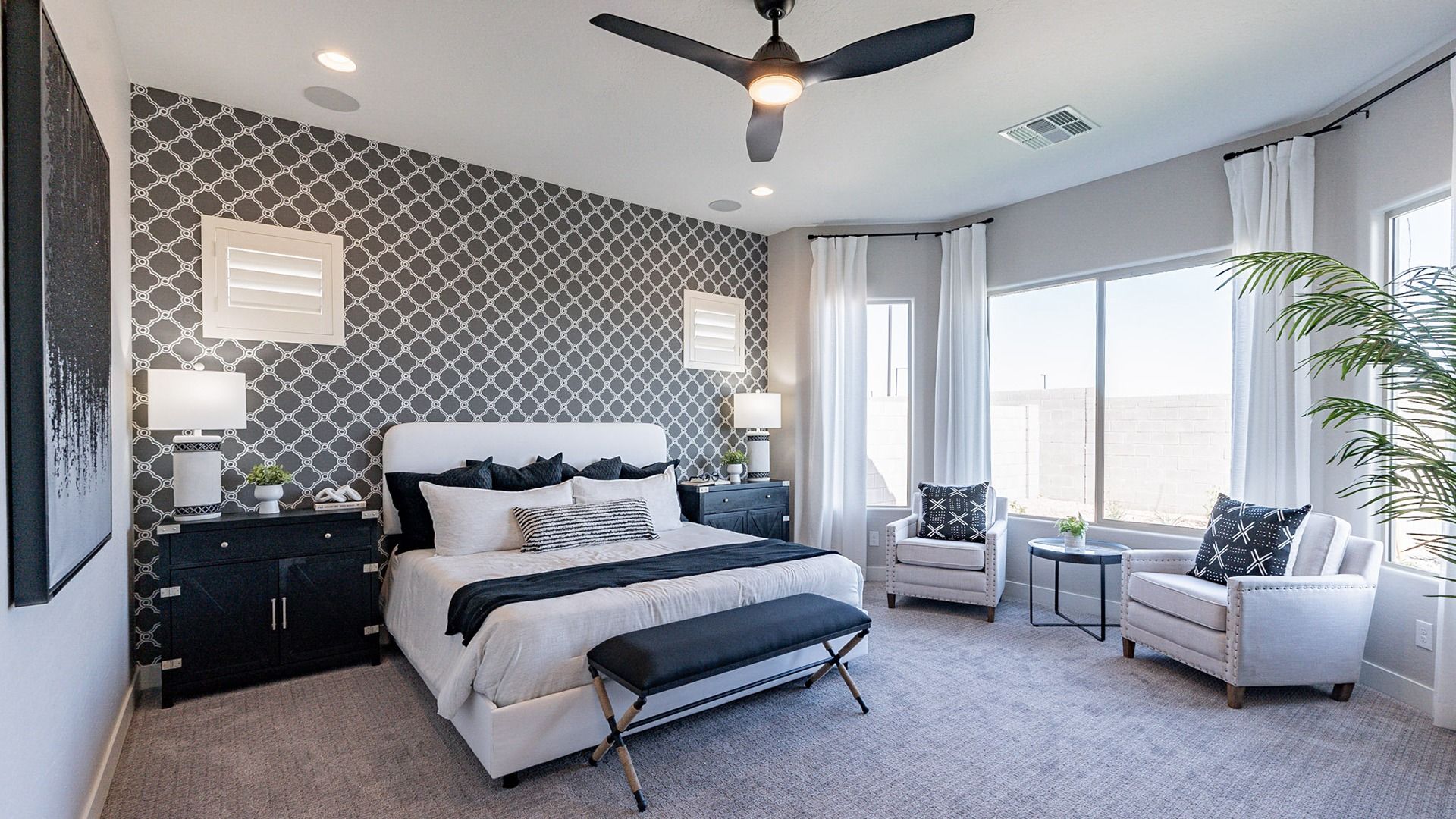 Revel in opulence with a striking patterned accent wall and expansive windows in Arroyo Seco.