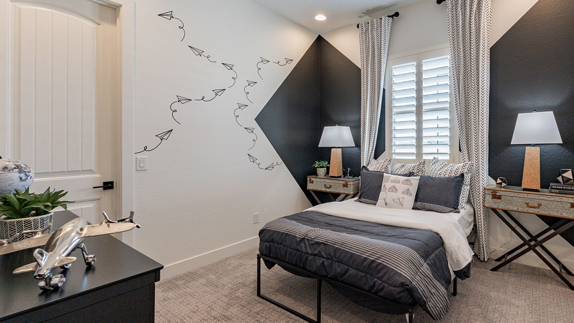 Sophisticated bedroom with geometric accents, bespoke furnishings, located in Arroyo Seco Hacienda.