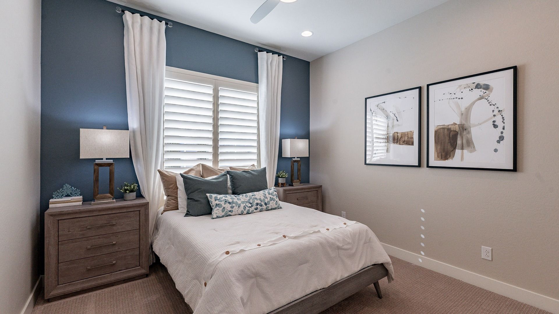 Experience luxury with a chic blue accent wall, elegant lighting, and exquisite decor in Arroyo Seco Hacienda.