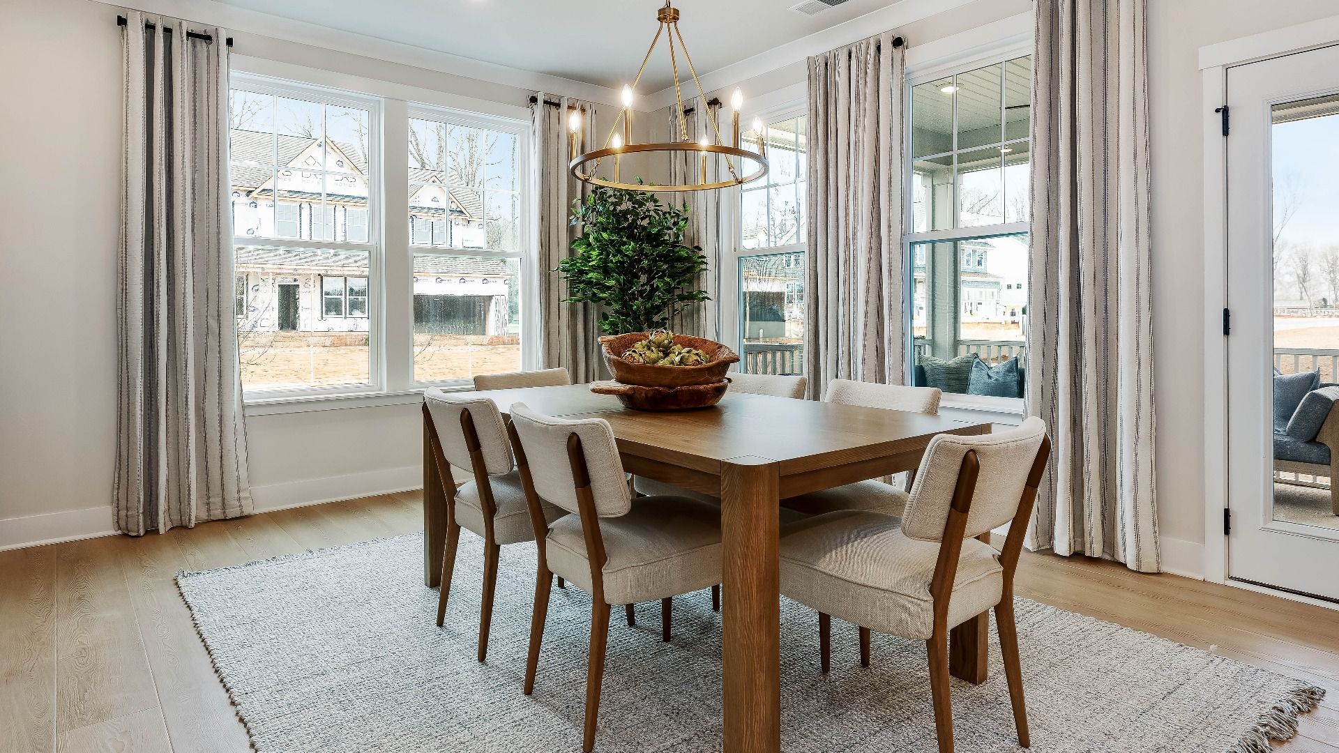 Stonefield home plan large breakfast area connecting to the kitchen and family room