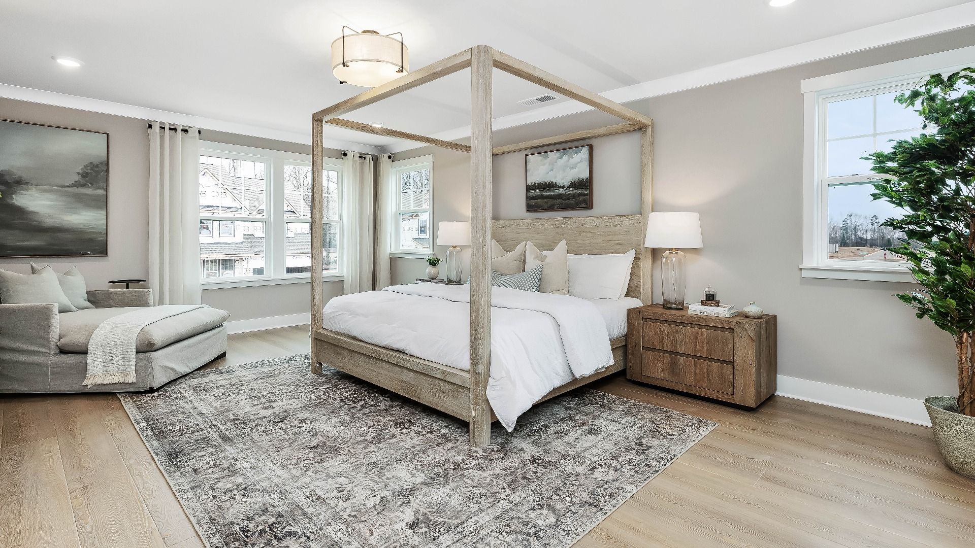Stonefield home plan large primary suite with sitting room, walk-in closet and en suite bathroom